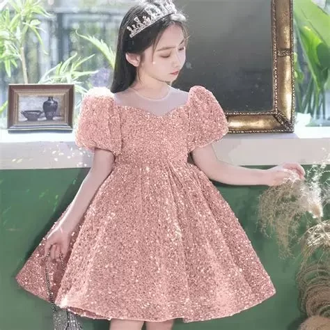 Sparkle in Style: How to Choose the Perfect Kids Party Dresses with Glitter